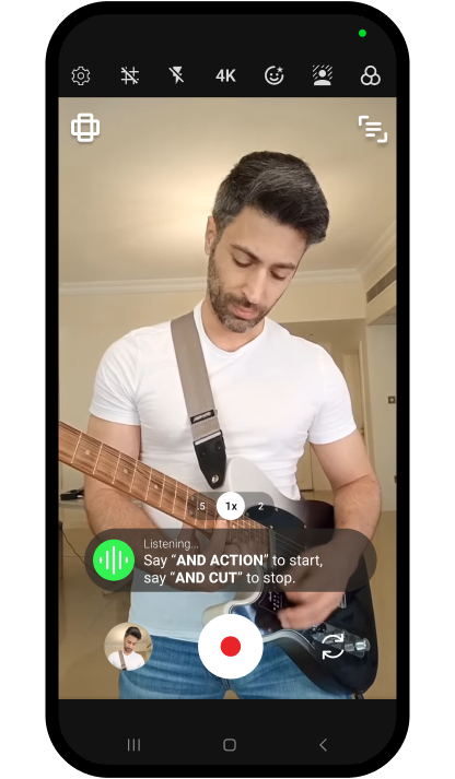 Shootsolo listening for the preset voice keywords And Action and And Cut while a guitarist films himself